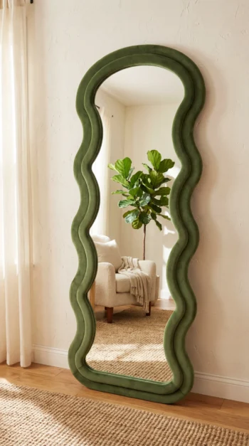 Sage Moss Wave Mirror in a lounge corner with plants