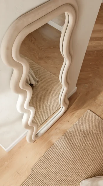 Cream Velvet Wave Mirror plush cream velvet frame close-up 1